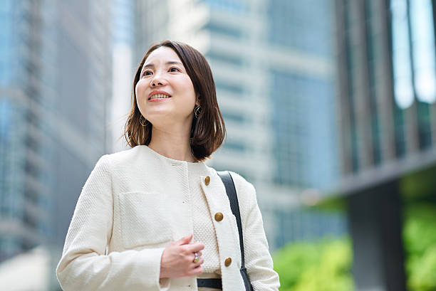istock A woman commuting in a business district 2222111479