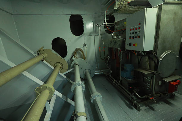 istock Cruise ship engine room interior with water tight doors electrical and diesel engines, water pipes, measuring instruments, diesel engines 2222111588