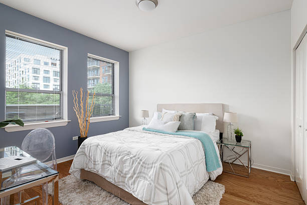 istock A white and blue bedroom with cozy bedding. 2222112615