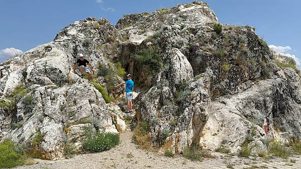 istock Two teenagers rock climbing 2222112807