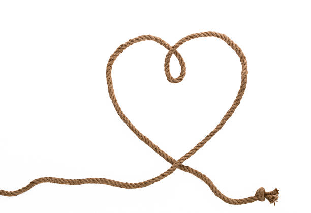 istock Heart shaped design made of brown rope 2222113186