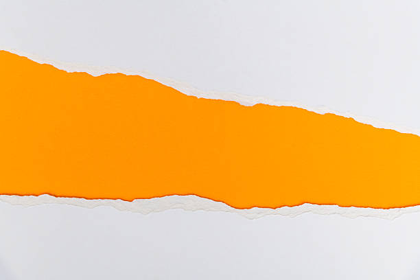 istock Torn white paper revealing orange space 2222113262