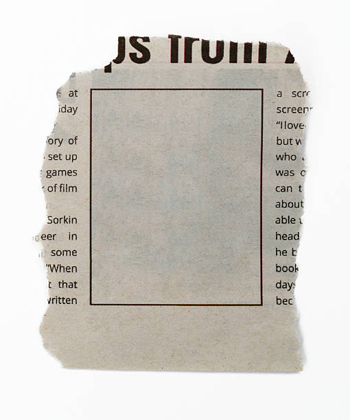 istock A torn piece of newspaper on white background 2222113814