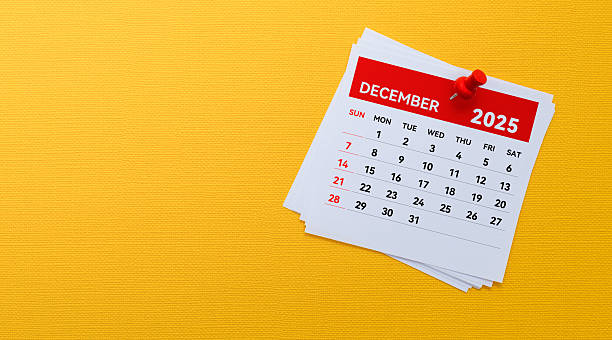 istock 2025 December calendar on yellow background 2222113856