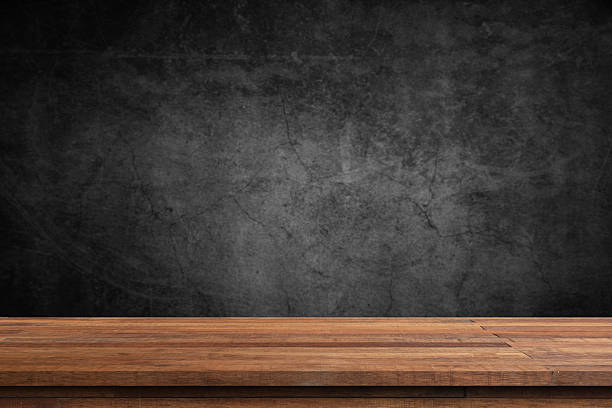 Empty wood, marble or stone table top with many blur backgrounds like tropical jungle, ocean, mountains, interior and sunsets in summer green. The table giving copy space for placing advertising product on the table along with beautiful forest banner background.