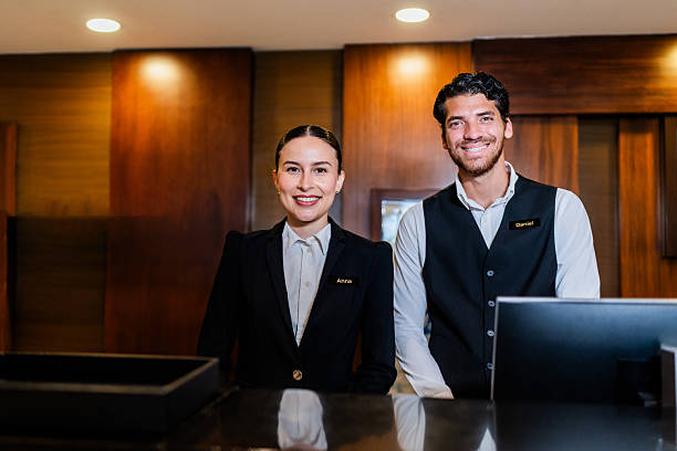 istock Portrait of young receptionists at hotel 2222130094