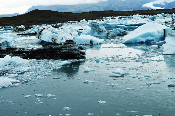 Majestic Glacier with icebergs on a calm lake