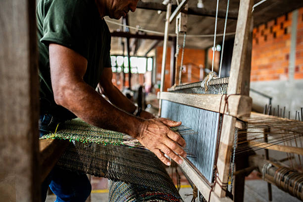 istock Close-up of a man working at textil industry 2222134306
