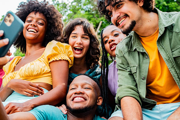 istock Friends taking a selfie on public park 2222136257