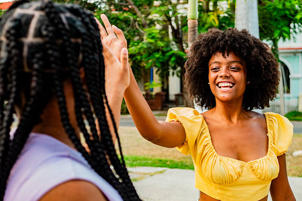 istock Friends women doing high-five outdoors 2222136334