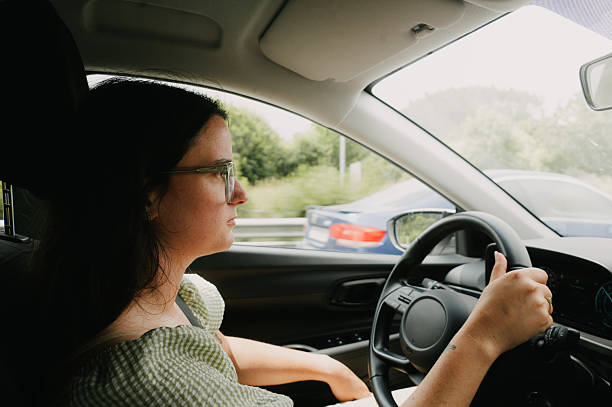 istock Woman driving a car 2222139599