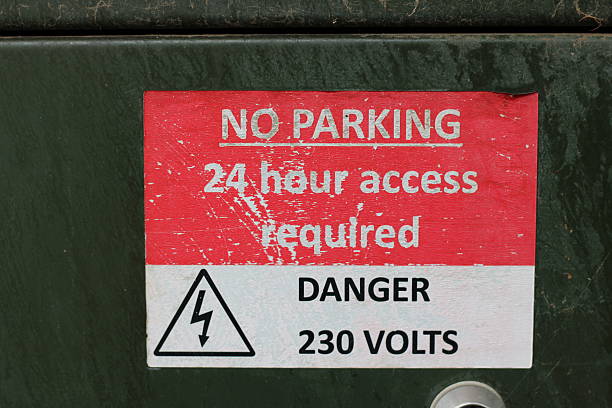 istock No Parking 24 hour access required Danger 230 Volts sign 2222145536