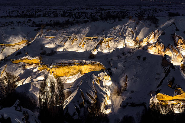istock Pigeon Valley Illuminated at Night in Winter, Cappadocia 2222148201