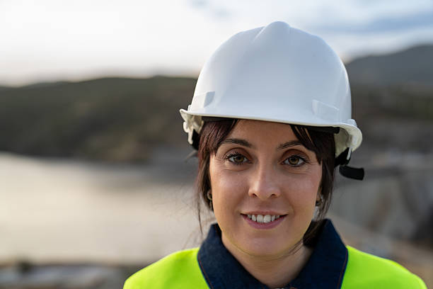 istock Young female engineer smiling confidently at construction site 2222151509