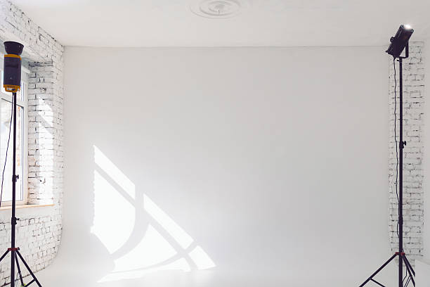 istock Clear white cyclorama. Light background with with professional lighting equipment. Plain wall empty photo studio. 2222153650