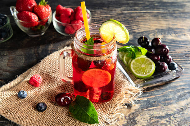 istock Berry cooling cocktail in a glass jar close-up. Copy space. 2222153906