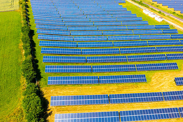 istock Aerial view: photovoltaic modules on field in summer 2222155438