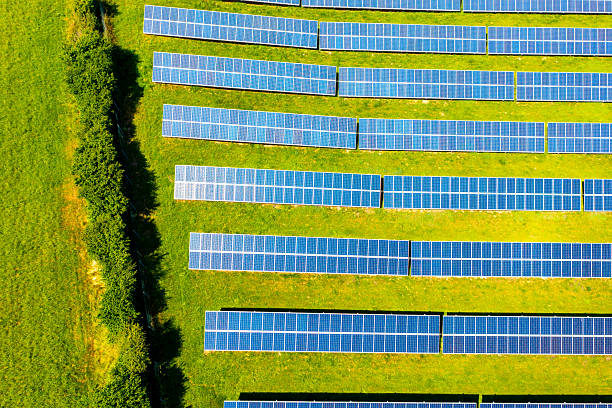 istock Aerial view: photovoltaic modules on field in summer 2222155441