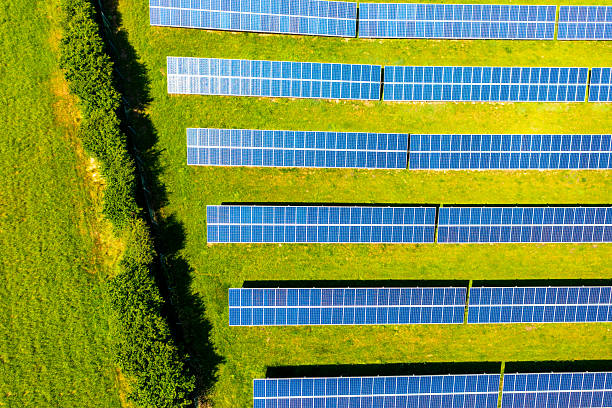 istock Aerial view: photovoltaic modules on field in summer 2222155456