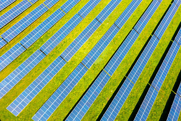 istock Aerial view: photovoltaic modules on field in summer 2222155459