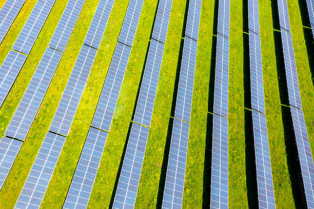 istock Aerial view: photovoltaic modules on field in summer 2222155461