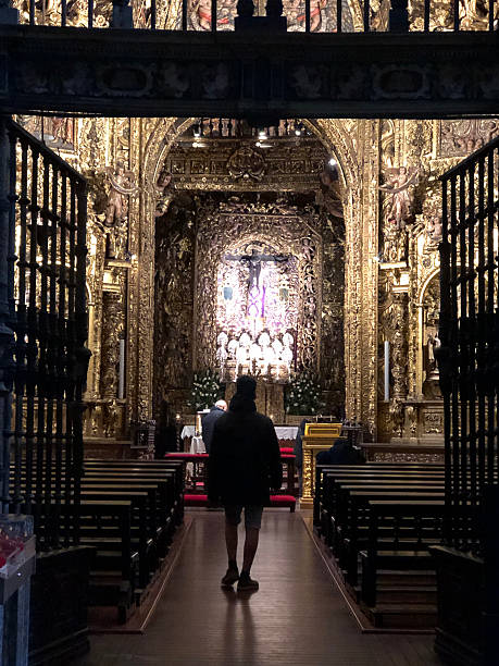 istock Young woman walks inside cathedral 2222163767