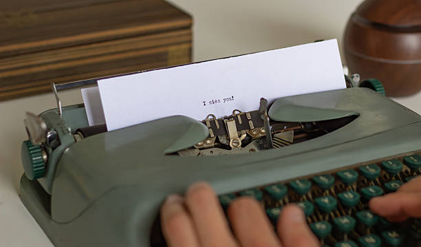 istock Writer typing I miss you on vintage typewriter, expressing longing and affection 2222166016