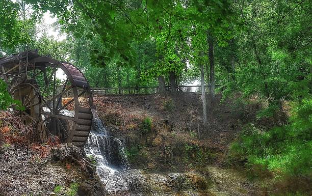 istock Old Historical Structure on Top of Waterfall Overlooking River 2222167261