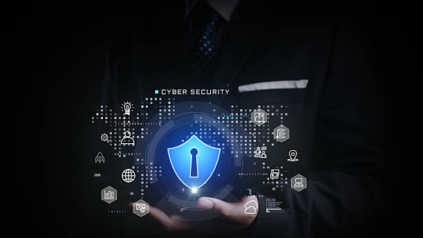 istock Businessman presenting glowing cybersecurity shield surrounded by digital icons, representing secure network, data protection, and digital privacy in a virtual business environment. 3d Rendering 2222169061