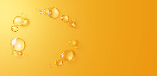 istock 3D Illustration.Background image of multiple water droplets on yellow background. Copy space. (Horizontal) 2222176154