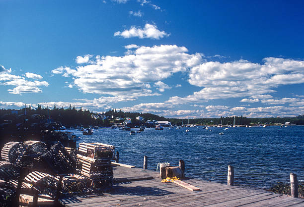 Piscataqua river from Memorial bridge in Portsmouth, New Hampshire, during summer day with boats and houses