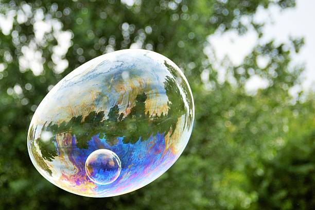 istock Colorful Bubble Within a Bubble Reflecting Trees in Park 2222178958