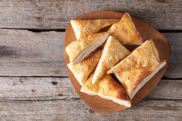 istock Delicious puff pastry on wooden table, top view. Space for text 2222182193