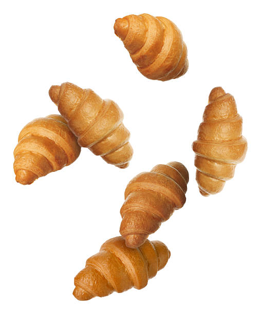 istock Puff pastry. Fresh croissants falling on white background 2222183088