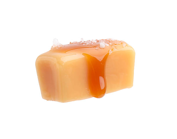 istock Yummy candy with salted caramel isolated on white 2222183153