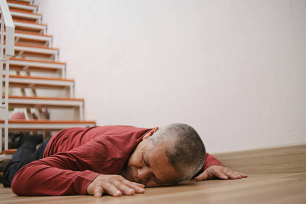 istock Unconscious Senior Male Falling Down Stairs 2222183955