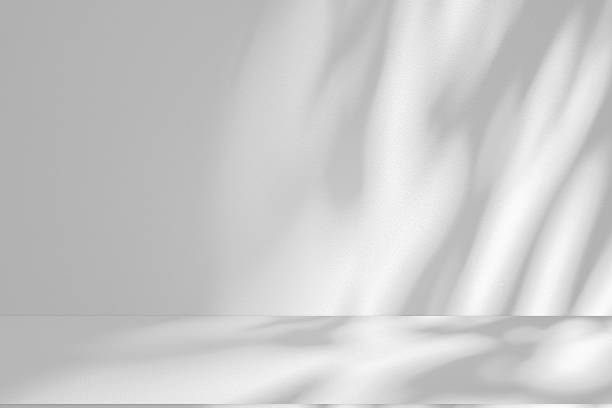 istock Wall interior background, studio and backdrops show products.with shadow from window color white . background for text insertion and presentation product 2222188291