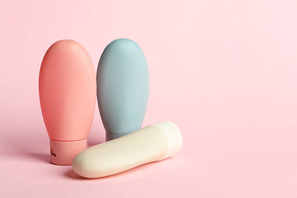 istock Cosmetic travel on pink background. Space for text 2222188755