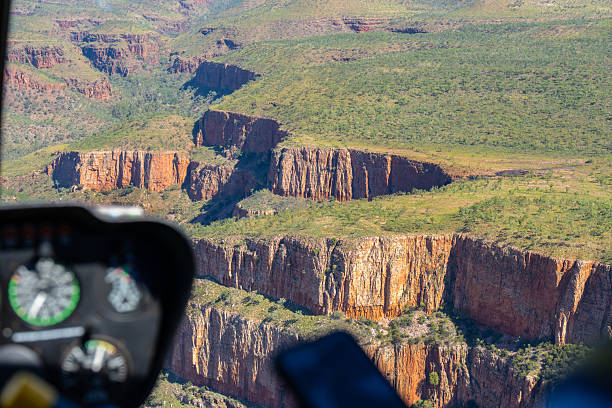 istock Flying in helicoptor over iron red sheer cliffs and gorges in the Kimberley 2222190765