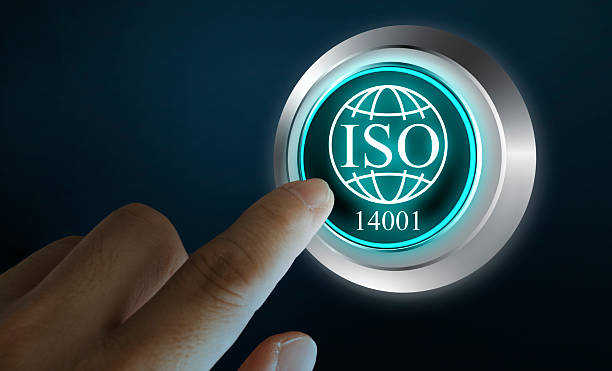 istock Finger pressing glowing ISO 14001 button on digital interface, concept of environmental management and compliance 2222195084