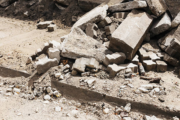 istock Destroyed urban structure with broken concrete. War-torn environment full of rubble. Demolished building remains. 2222195944