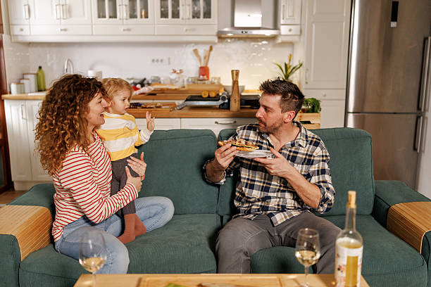 istock Happy family spending weekend at home 2222199446