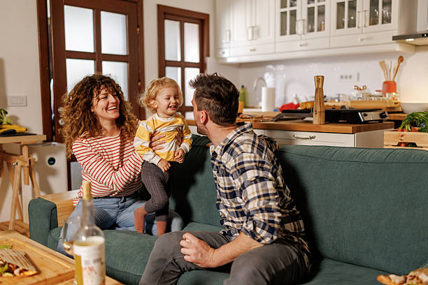 istock Happy family spending weekend at home 2222199681