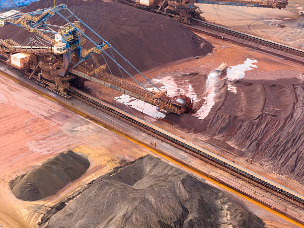 istock Colorful iron ore transshipment commercial terminal is in operation 2222203984