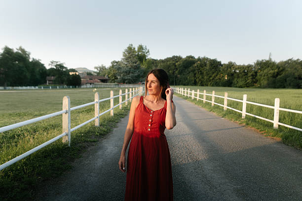 Portrait of a young woman with sunset light hitting her face