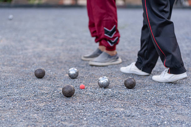 istock petanque player in playing field walking and bocce balls on ground,selective focus at boules,exercising,athlete,sport,competition 2222210993