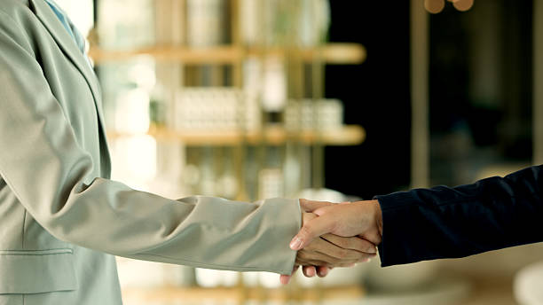 istock Handshake with partnership to join the business administration. 2222212068