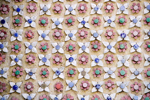 This image showcases a detailed floral pattern on wall tiles, featuring colorful designs that enhance the aesthetic of any space with vibrant and intricate elements.