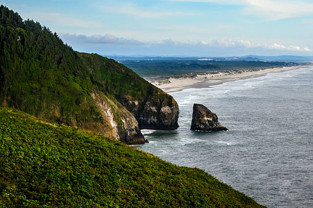 istock Scenic coastline view with cliffs and rocky formations under a clear sky on a sunny day 2222215211