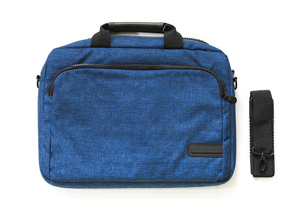 istock Modern blue fabric laptop bag with a removable shoulder strap, designed for convenient and stylish everyday use, isolated on white. 2222222173